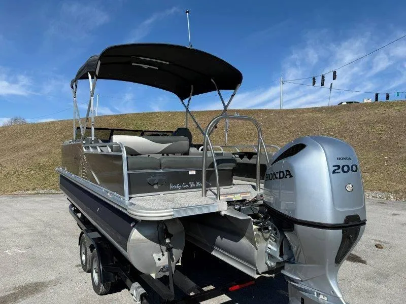 Slide: The Image of 2022 Tahoe LTZ VRB 2485 pontoon boat with Honda 200 outboard motor. - 29