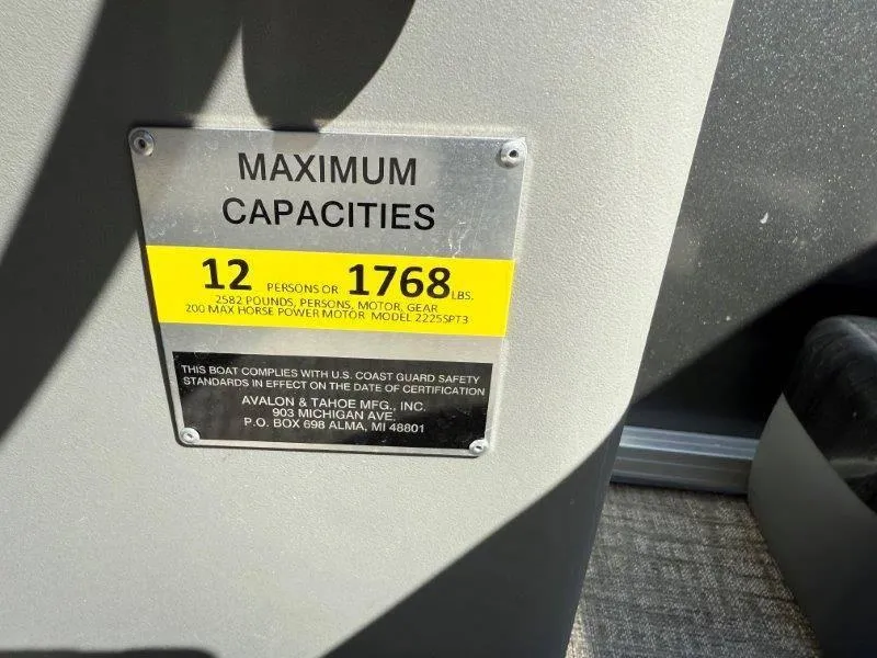 Slide: The Image of Capacity plate on 2022 Tahoe LTZ VRB 2485, max 12 persons or 1768 lbs. - 35