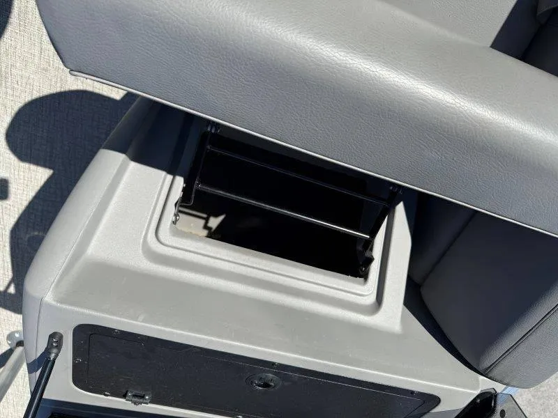 Slide: The Image of 2022 Tahoe LTZ VRB 2485 seat storage compartment, open and empty. - 42