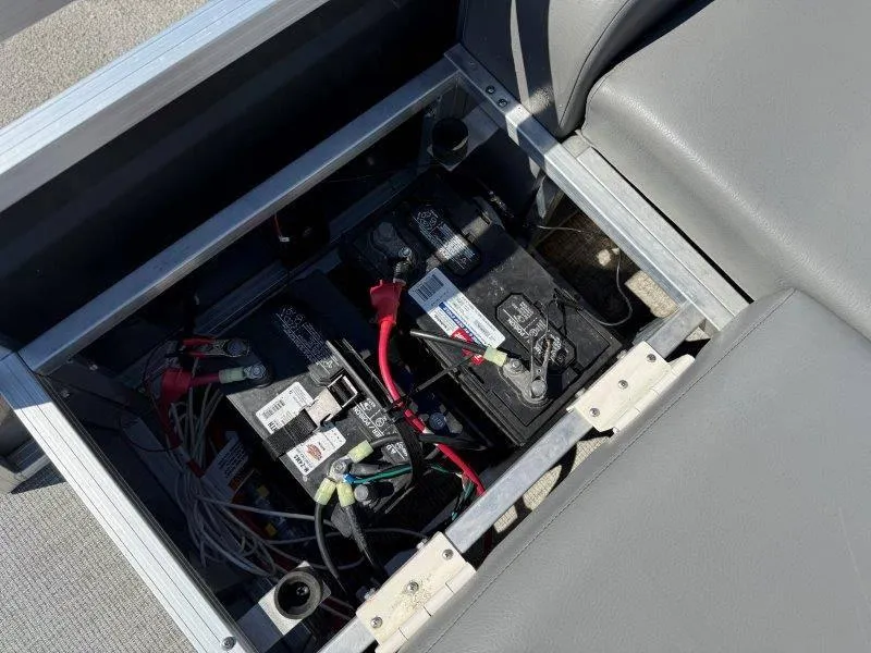 Slide: The Image of Battery compartment of 2022 Tahoe LTZ VRB 2485 with wiring and connections. - 50
