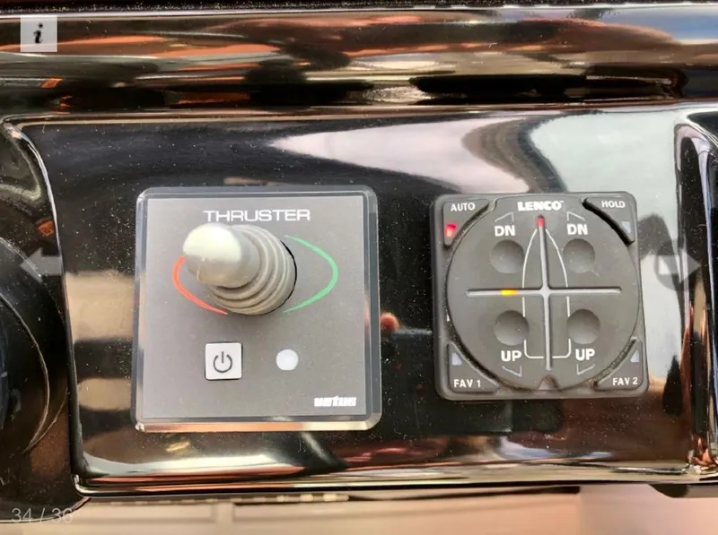 Slide: The Image of Control panel of 2017 Sea Ray Sundancer 280 with thruster and trim tab controls. - 3