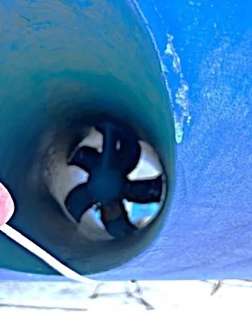 Slide: The Image of Close-up of a Beneteau Oceanis 46 propeller, 2007 model, in a blue hull. - 10