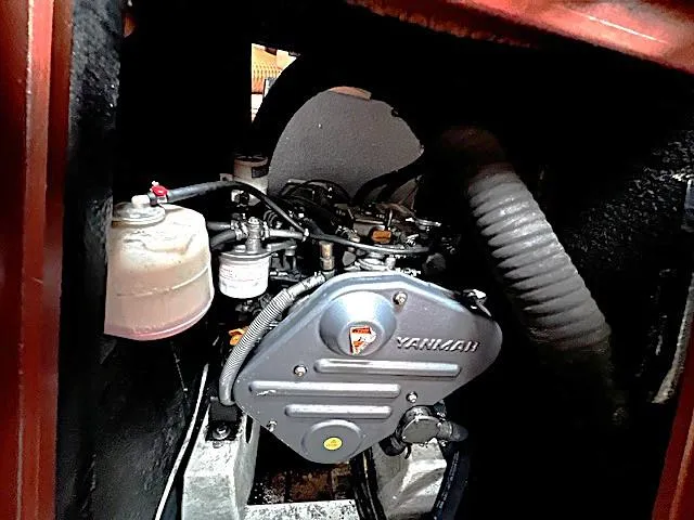 Slide: The Image of Engine compartment of a 2007 Beneteau Oceanis 46 sailboat, featuring a Yanmar engine. - 35