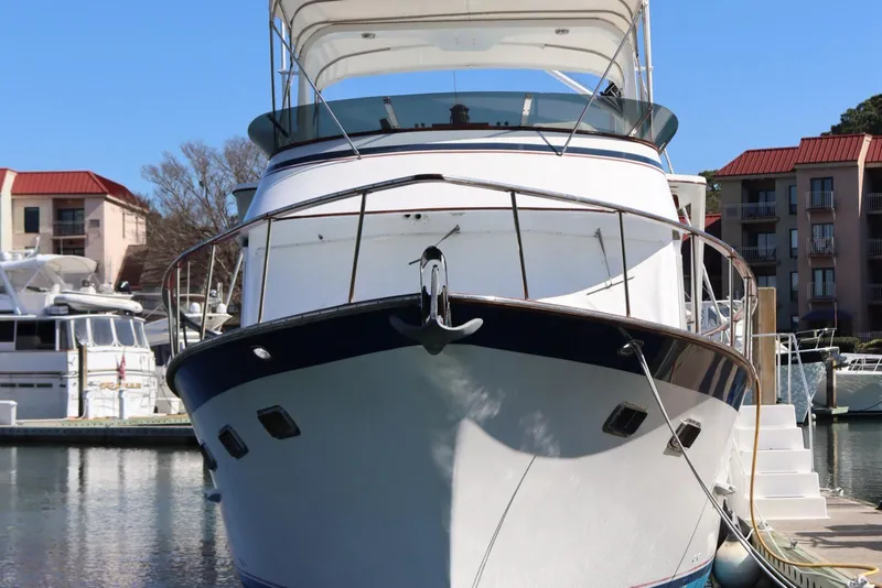 Slide: The Image of 1985 DeFever 44 Trawler docked at marina, front view. - 19