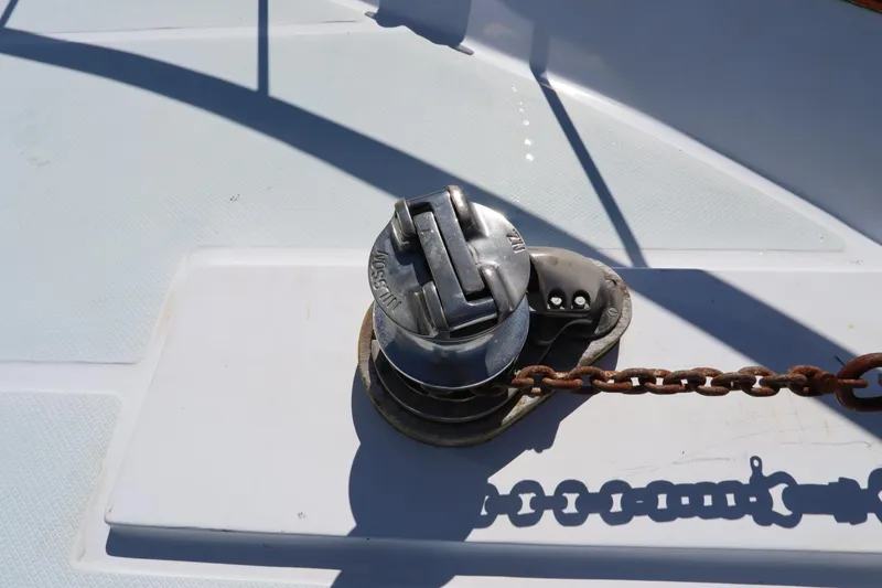 Slide: The Image of Anchor winch on 1985 DeFever 44 Trawler deck with chain. - 27
