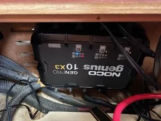 Slide: The Image of NOCO Genius GENPRO 10x3 battery charger in a 2005 Hunter 33 boat. - 9