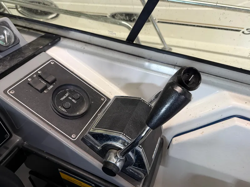 Slide: The Image of 1988 Formula 29 PC boat throttle and control panel close-up. - 26