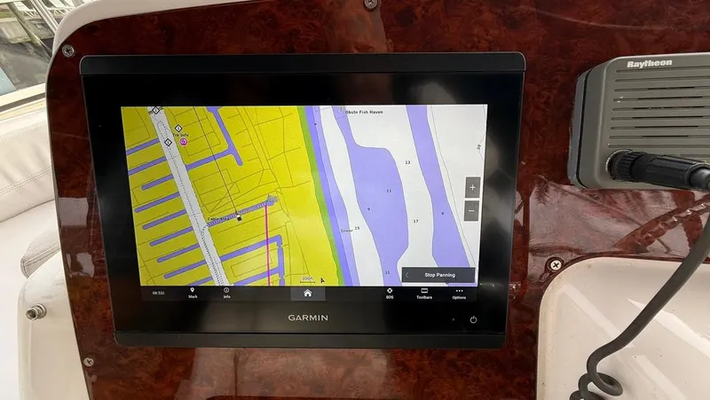 Slide: The Image of Garmin navigation display on 2001 Silverton 410 Sport Bridge yacht dashboard. - 16