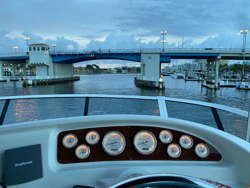 Slide: The Image of View from 2001 Silverton 410 Sport Bridge helm, overlooking a drawbridge and marina. - 19