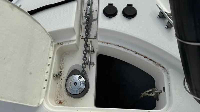 Slide: The Image of Anchor chain compartment on 2001 Silverton 410 Sport Bridge boat deck. - 9