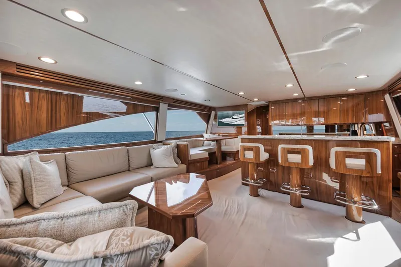Slide: The Image of Luxurious interior of 2019 Viking 68 Convertible yacht with elegant seating and ocean view. - 16