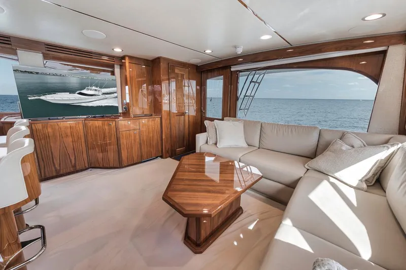 Slide: The Image of Luxurious interior of 2019 Viking 68 Convertible yacht with ocean view and elegant furnishings. - 20