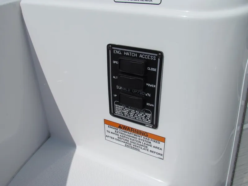 Slide: The Image of Control panel on 2020 Cruisers Yachts 35 Express with warning label. - 22