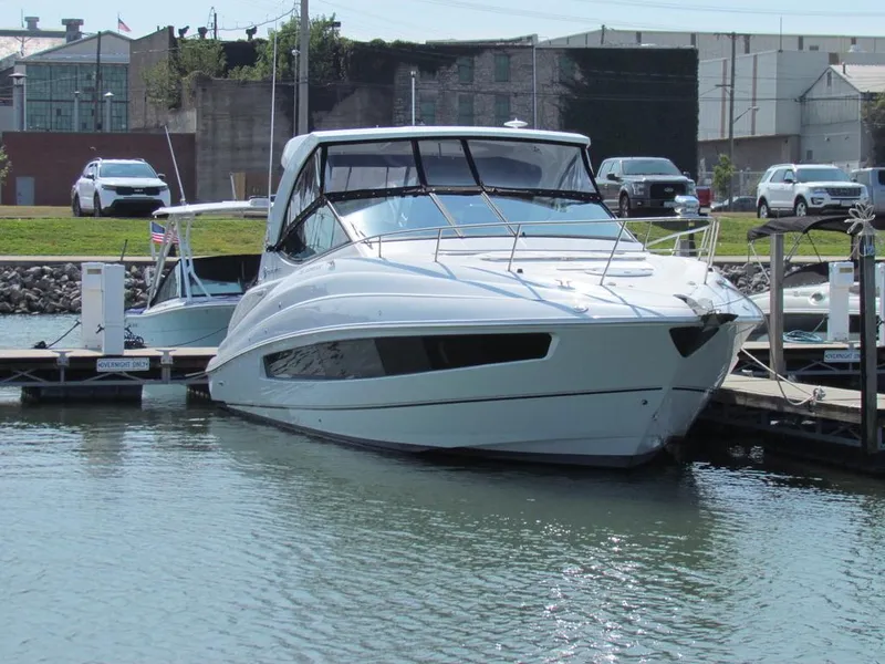 Slide: The Image of 2020 Cruisers Yachts 35 Express docked at marina, front view. - 23