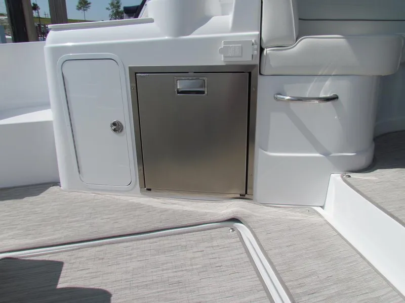 Slide: The Image of 2020 Cruisers Yachts 35 Express interior with stainless steel cabinet and white seating. - 27