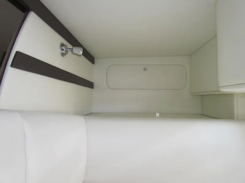 Slide: The Image of Interior cabin of 2020 Cruisers Yachts 35 Express, featuring sleek white design. - 48