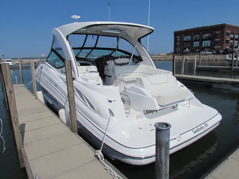 Slide: The Image of 2020 Cruisers Yachts 35 Express docked at marina, rear view. - 5