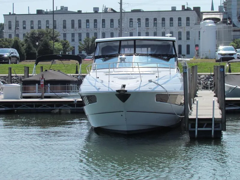 Slide: The Image of 2020 Cruisers Yachts 35 Express docked at marina, front view. - 9