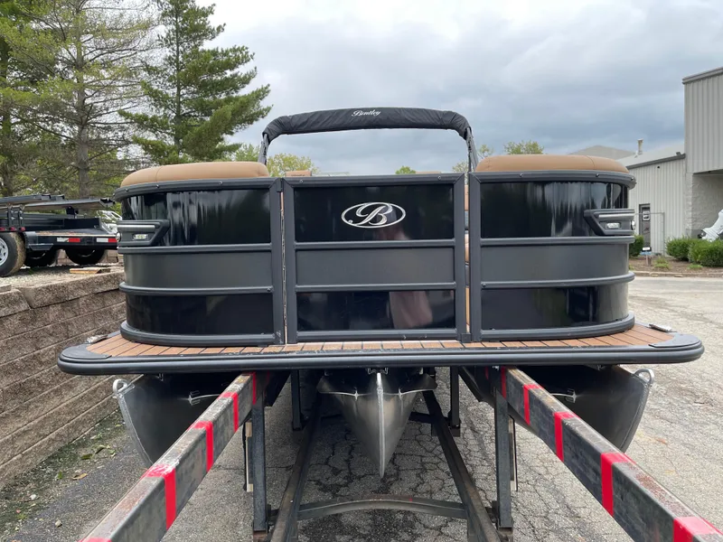 Slide: The Image of 2025 Bentley Pontoons Elite 223 Admiral on trailer, showcasing sleek design and luxury features. - 3