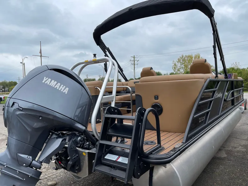 Slide: The Image of 2025 Bentley Pontoons Elite 223 Admiral with Yamaha engine, featuring spacious seating and sleek design. - 6