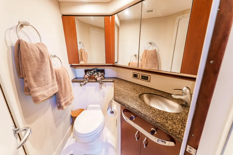 Slide: The Image of Luxurious bathroom in 2005 Sea Ray 550 Sedan Bridge yacht with elegant fixtures. - 22