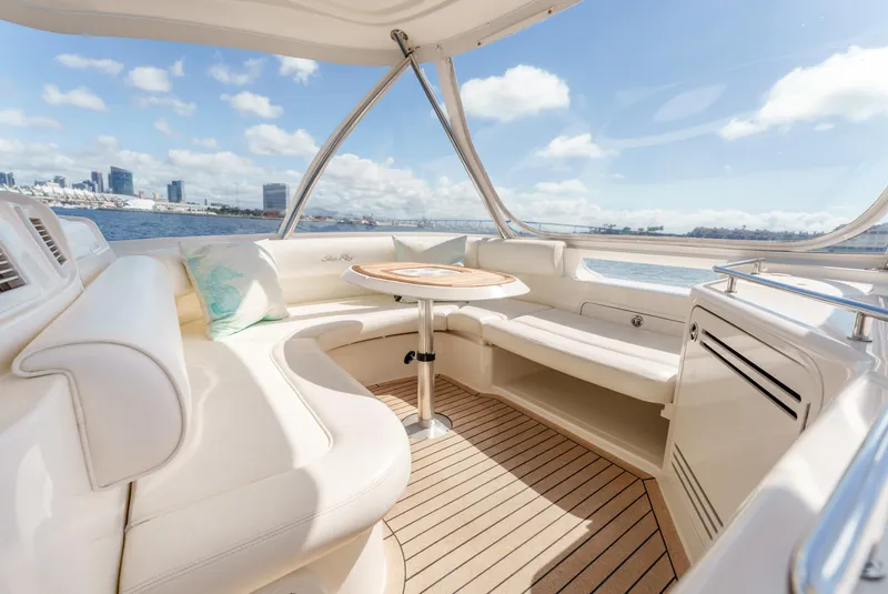 Slide: The Image of Luxurious 2005 Sea Ray 550 Sedan Bridge yacht interior with elegant seating and scenic ocean view. - 7