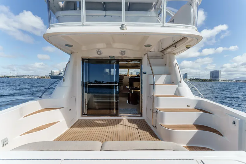 Slide: The Image of 2005 Sea Ray 550 Sedan Bridge yacht with spacious deck and elegant interior. - 9