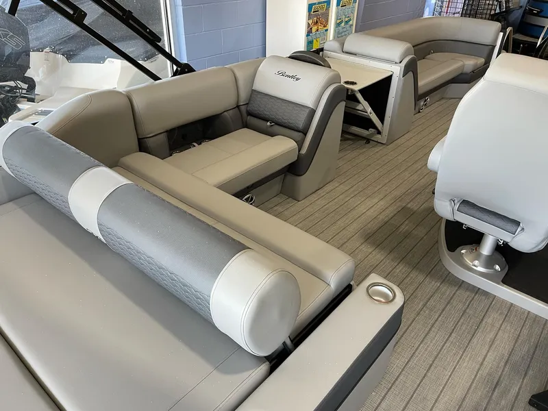 Slide: The Image of 2025 Bentley Pontoons Elite 253 Swingback interior with luxurious seating and modern design. - 11
