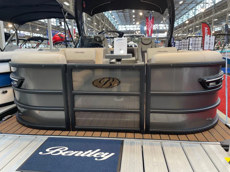 Slide: The Image of 2025 Bentley Pontoons Elite 223 Swingback Tower at a boat show display. - 6