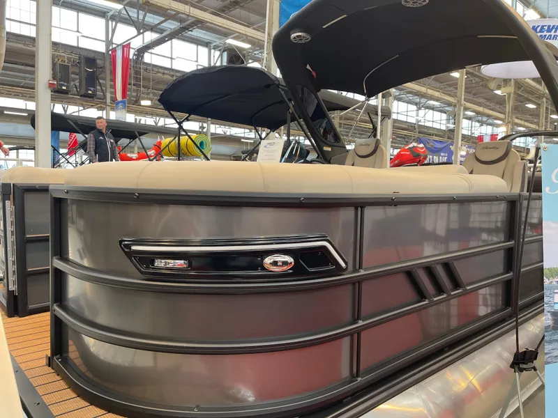 Slide: The Image of 2025 Bentley Pontoons Elite 223 Swingback Tower at a boat show display. - 7
