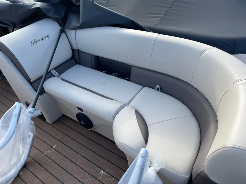 Slide: The Image of 2025 Bentley Pontoons Legacy 223 Navigator interior seating with elegant upholstery. - 5