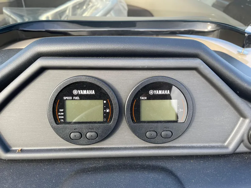 Slide: The Image of Yamaha gauges on 2025 Bentley Pontoons Legacy 223 Navigator dashboard, displaying speed, fuel, and tachometer. - 8