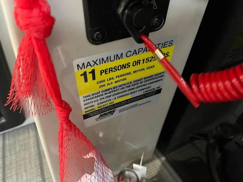 Slide: The Image of Capacity label on 2025 SunCatcher Select 322RC, indicating 11-person or 1522 lbs limit. - 13