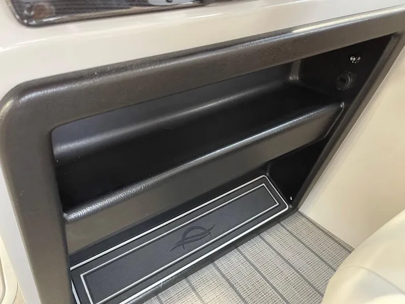Slide: The Image of Interior storage compartment of 2025 SunCatcher Select 322RC boat. - 14