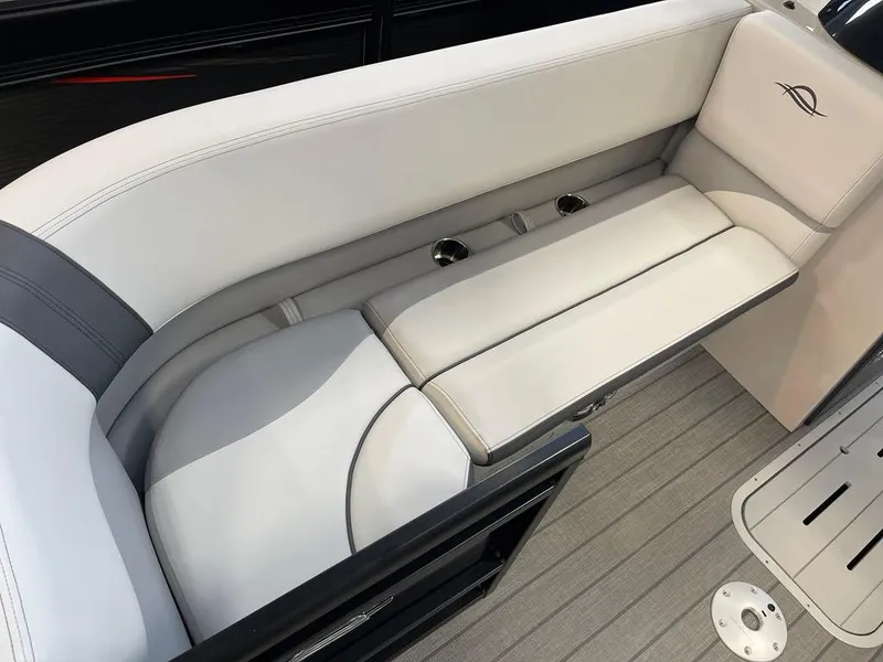 Slide: The Image of Luxurious seating on 2025 SunCatcher Select 322RC boat with sleek design and cup holders. - 5