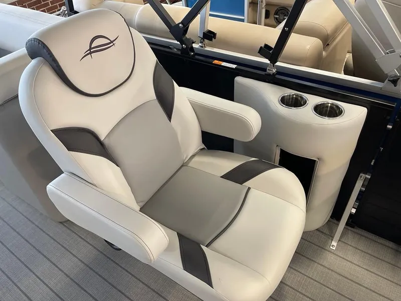 Slide: The Image of Luxurious seating on 2025 SunCatcher Select 322RC boat with cup holders. - 8