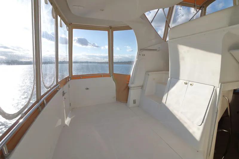 Slide: The Image of Interior of 2002 Carver 346 Motor Yacht with sea view. - 11