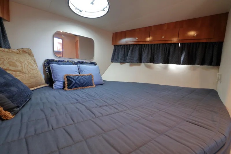 Slide: The Image of Interior of 2002 Carver 346 Motor Yacht with cozy bed. - 19