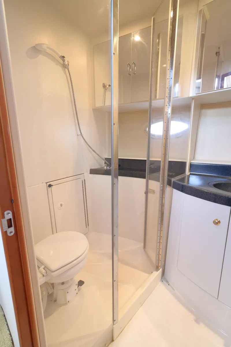 Slide: The Image of 2002 Carver 346 Motor Yacht bathroom with shower and toilet. - 21