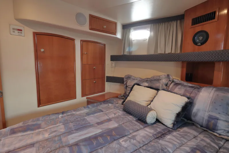 Slide: The Image of Interior of 2002 Carver 346 Motor Yacht with cozy bedroom. - 25