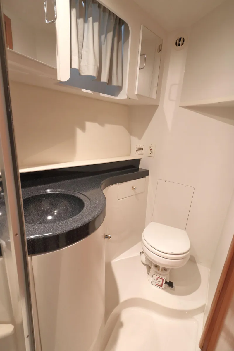 Slide: The Image of Carver 346 Motor Yacht 2002 bathroom with sink and toilet. - 28