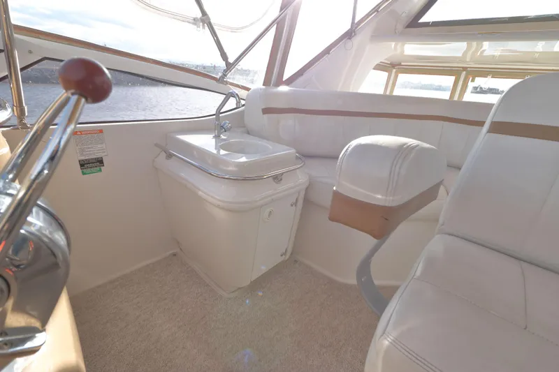 Slide: The Image of Interior of 2002 Carver 346 Motor Yacht with seating and sink. - 5