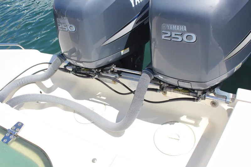 Slide: The Image of Twin Yamaha 250 engines on a 2008 Pursuit S 310 Sport boat. - 27