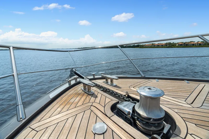 Slide: The Image of Bow of 2015 Riva 63 Virtus yacht with teak decking and anchor chain. - 11