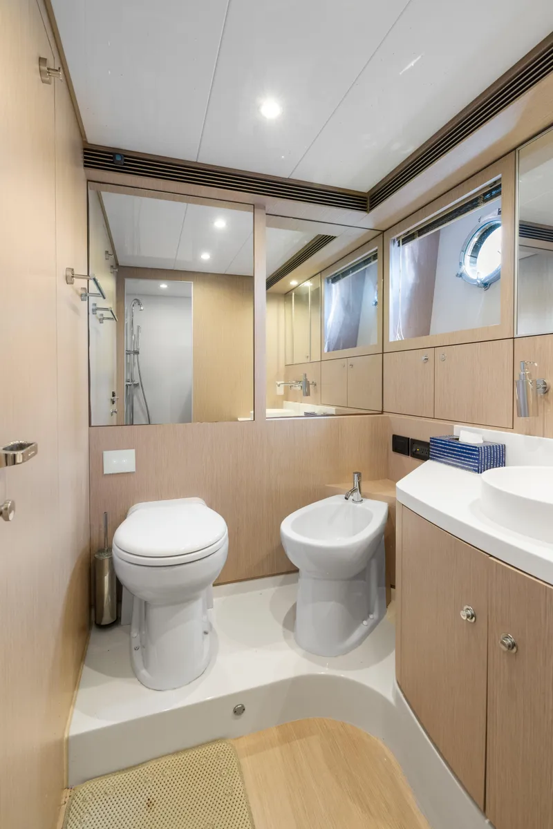 Slide: The Image of Luxurious bathroom interior of 2015 Riva 63 Virtus yacht with modern fixtures. - 32