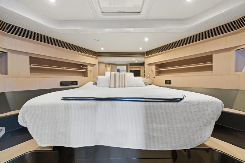 Slide: The Image of Luxurious interior of 2015 Riva 63 Virtus yacht with elegant bedding and modern design. - 35