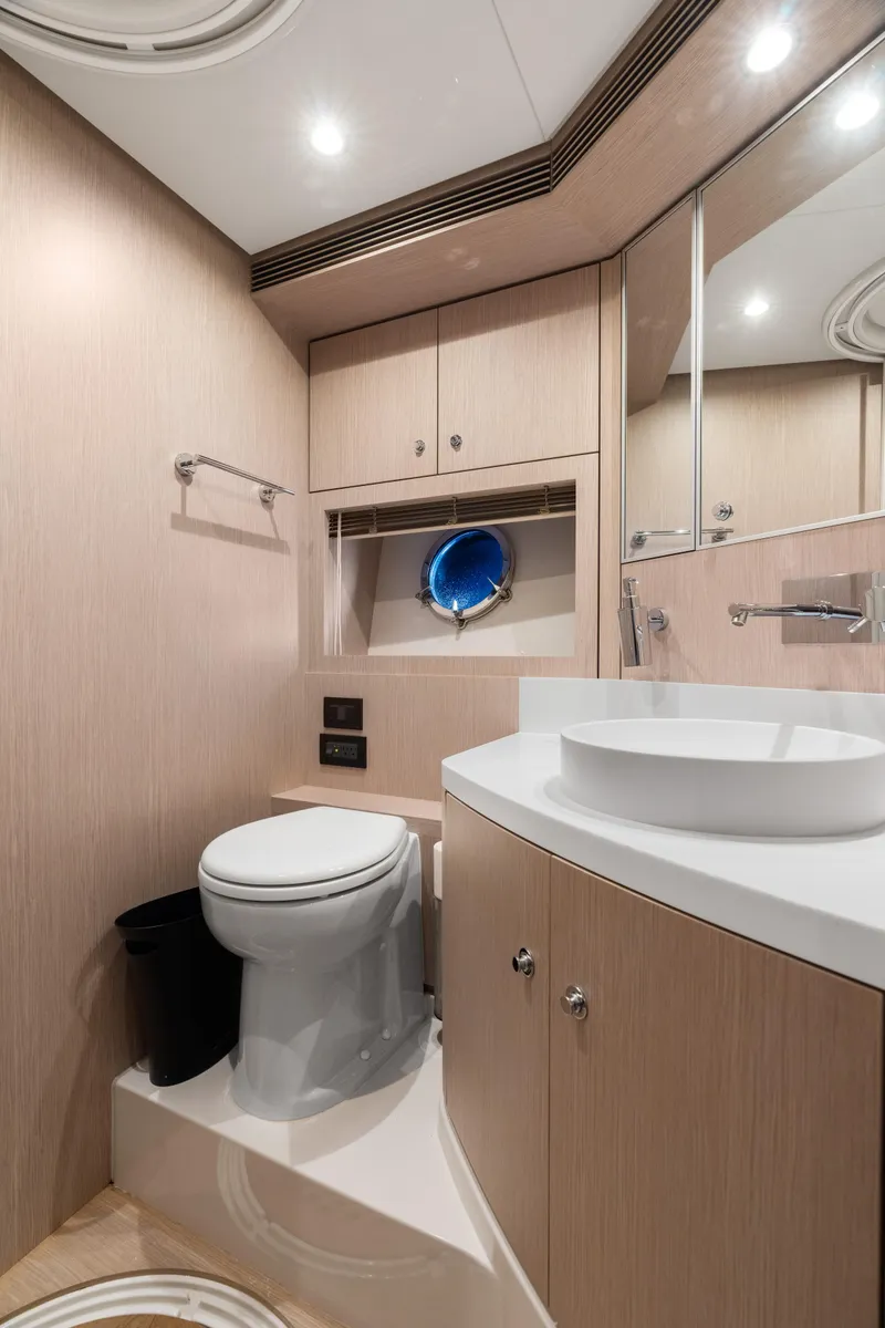 Slide: The Image of Luxurious bathroom on 2015 Riva 63 Virtus yacht with modern fixtures and elegant design. - 36