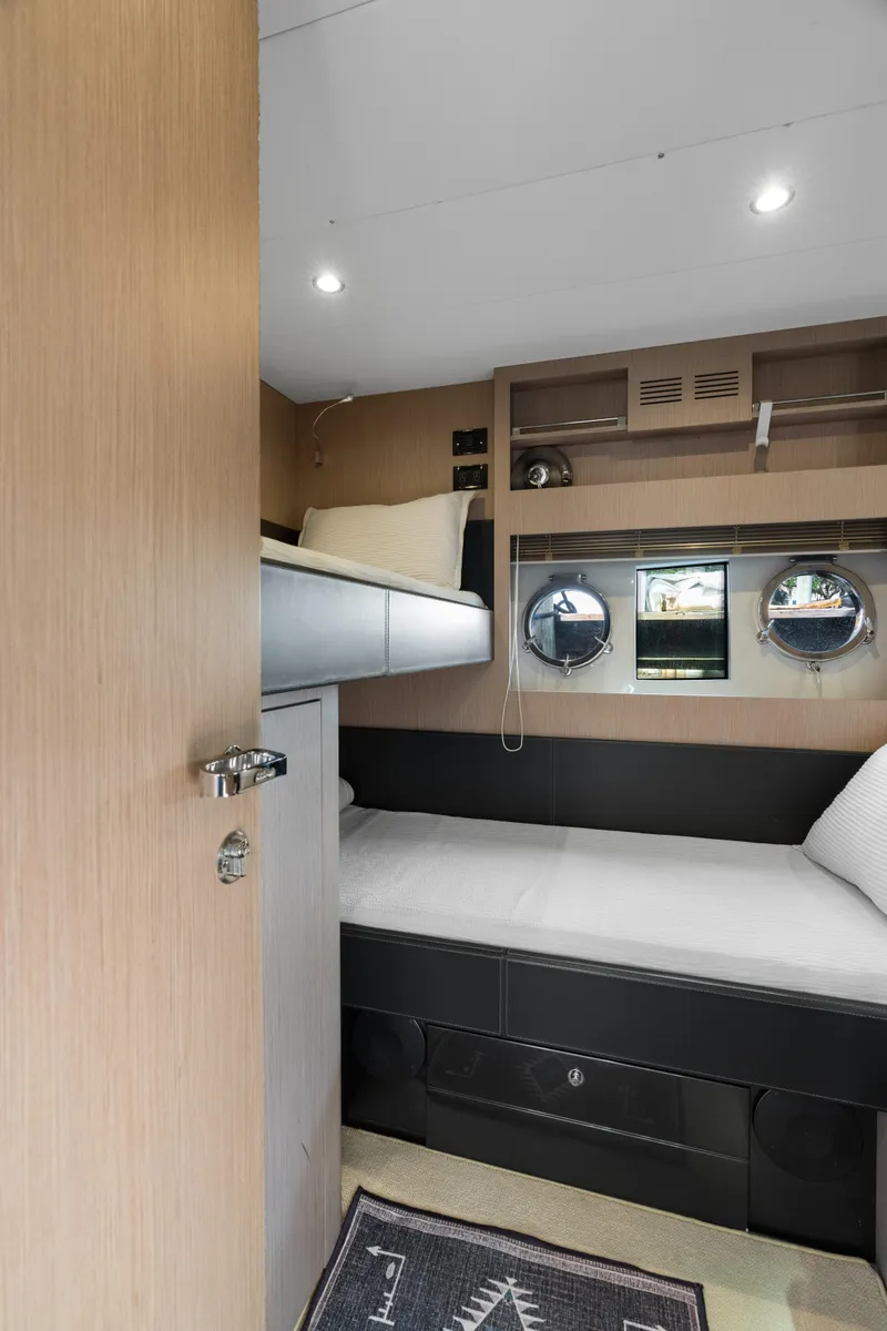 Slide: The Image of Interior cabin of 2015 Riva 63 Virtus yacht with modern bunk beds. - 39