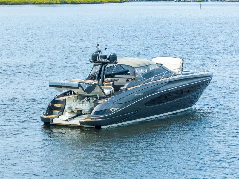 Slide: The Image of 2015 Riva 63 Virtus luxury yacht on calm water. - 4