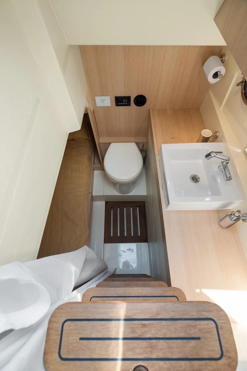 Slide: The Image of 2015 Riva 63 Virtus yacht bathroom with modern sink and toilet. - 41